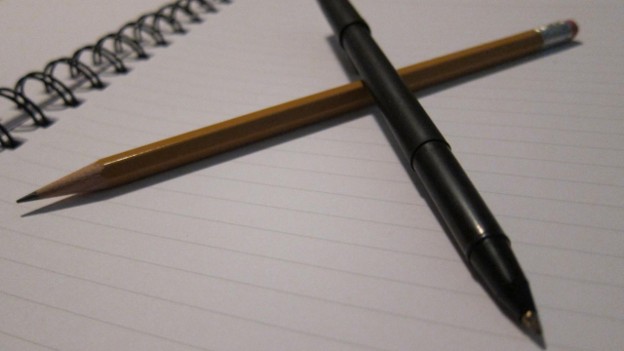 Pen and pencil in notebook (Photo credit: Paul E. Blom)